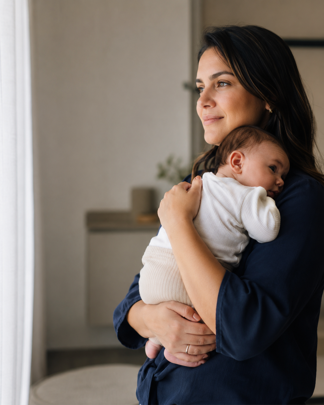 Mãe segurando seu bebê